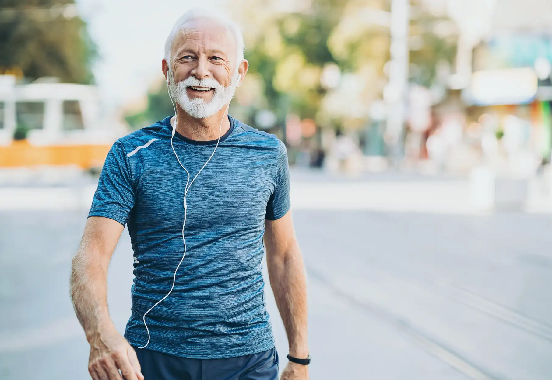 gracefully aging man walking in the street