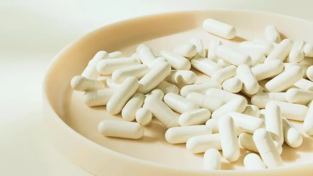 A bowl filled with longevity supplements