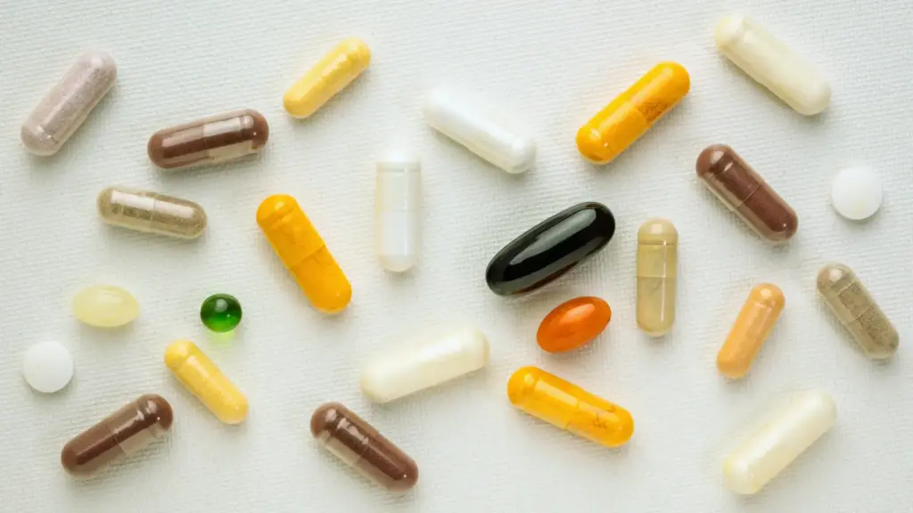 Colorful supplement capsules arranged on a table